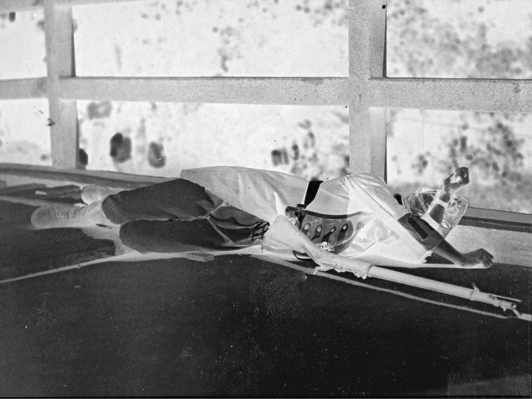 A British casualty, actually a Mass. National Guardsman, lies on Concord Bridge in 1930, his Model 1873 Springfield by his side. (Joseph Bilby Collection)