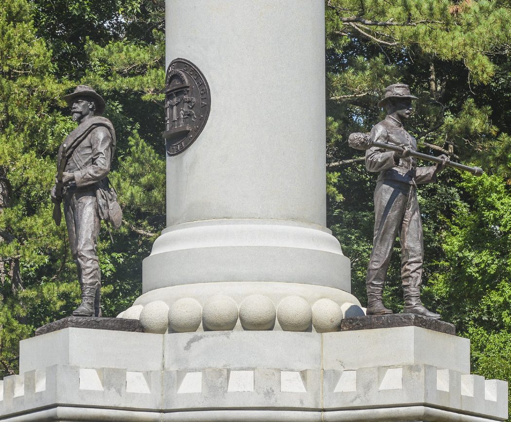 Rifleman and number 1 man on gun crew at the monument’s base.