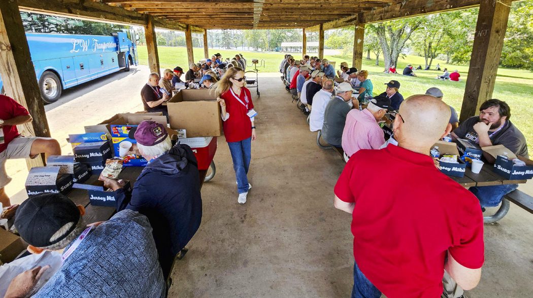 CVBT Tour attendees enjoy lunch on Saturday’s Wilderness tour. Katrina Bavone helping out.
